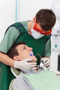 Male dentist for website 200x300 Early Intervention Theory and Evidence
